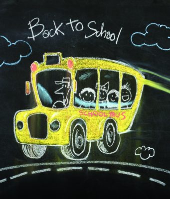 Tea with the Editor Colorful chalk drawing on a blackboard of a yellow school bus with smiling children and a driver, with "Back to School" written above.